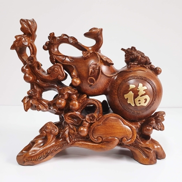 Tượng gỗ phong thủy đẹp để phòng khách hút tài lộc